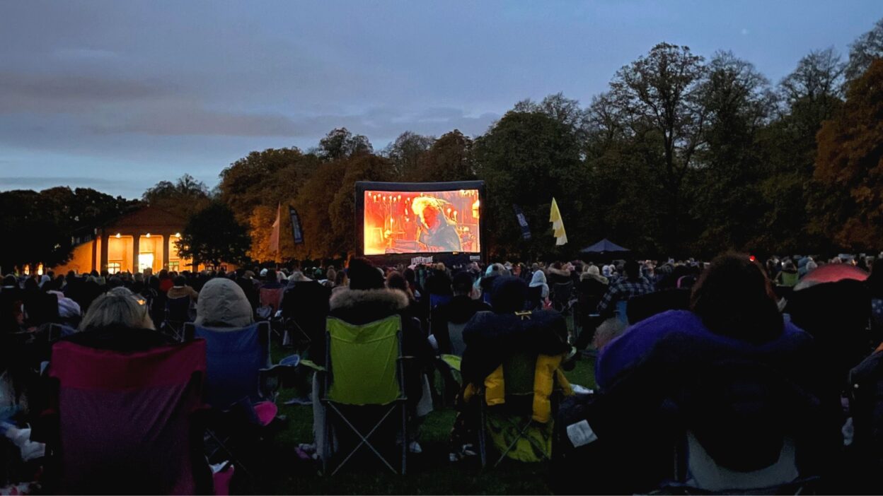 Group of People Watching Outdoor Cinemas