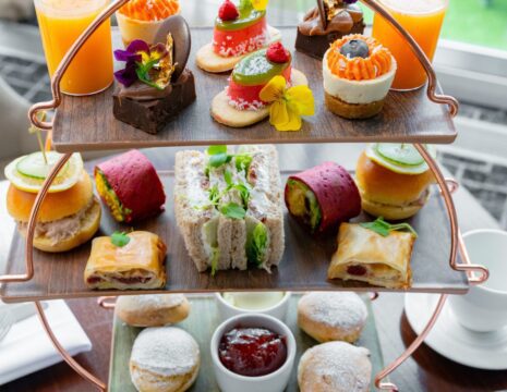 Three tiers of afternoon tea sweet and savoury items