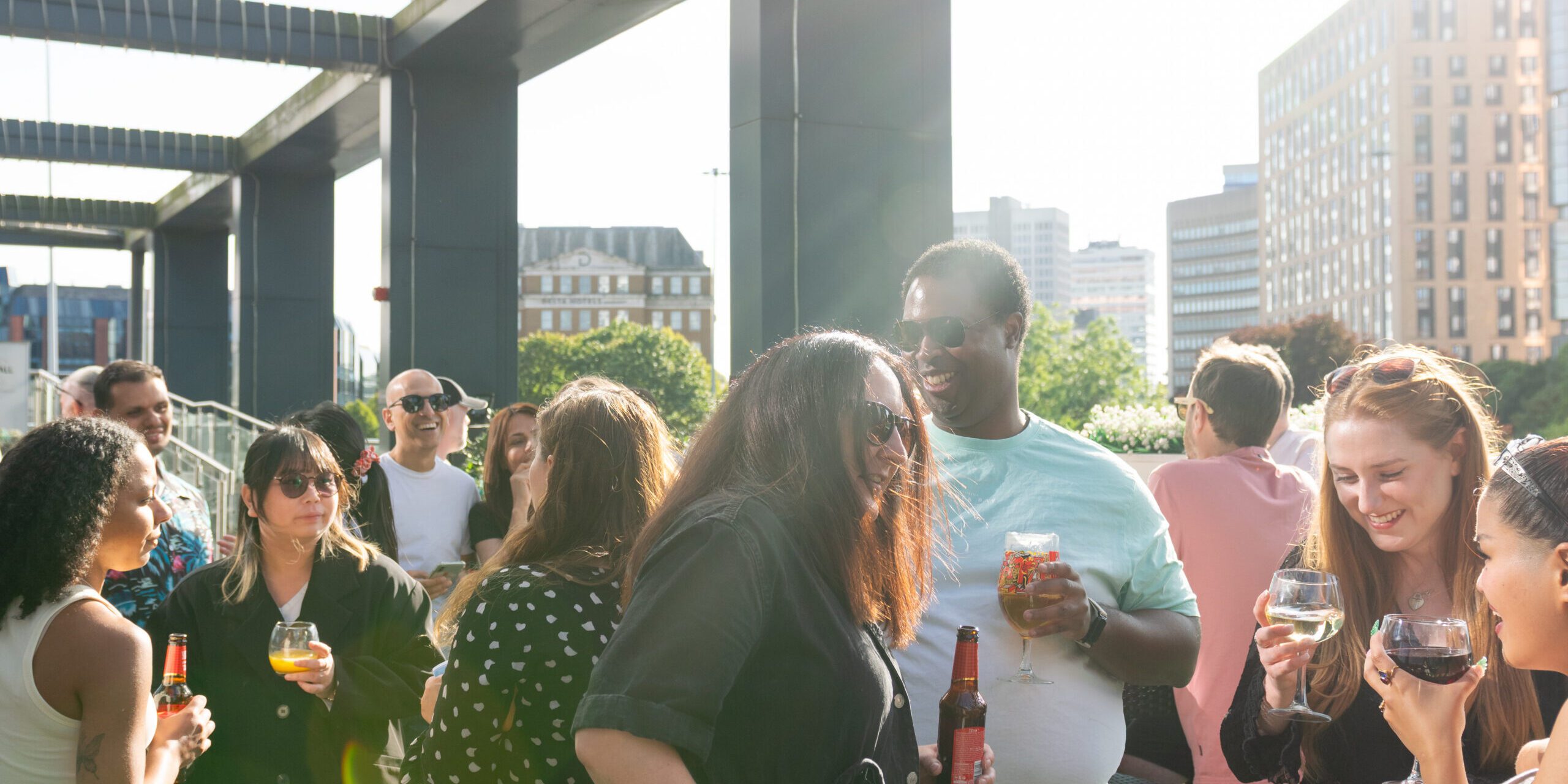 1565 Terrace at Park Regis Birmigham featuring people chatting and drinking